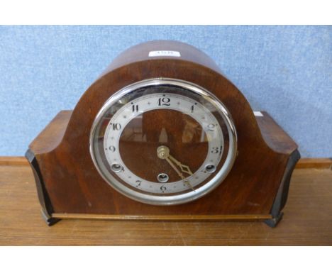 An Art Deco mahogany mantel clock