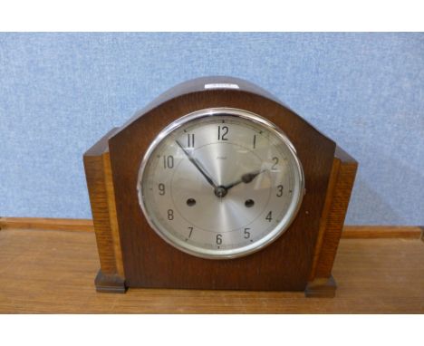 A Smiths Enfield oak Westminster chime mantel clock