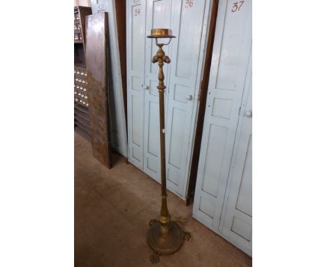 An early 20th Century brass standard lamp
