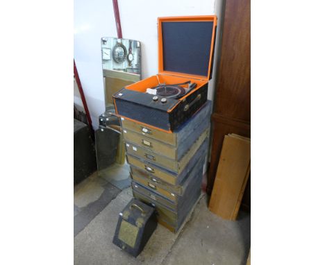 A vintage portable record player, coal scuttle and ten collector's drawers