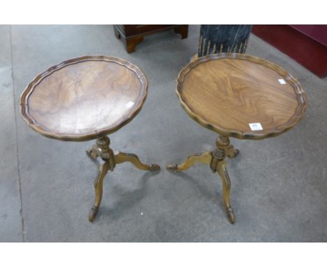 A pair of mahogany tripod wine tables