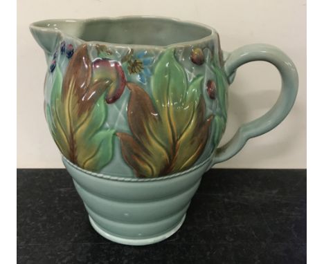 A Clarice Cliff Newport pottery Celtic leaf and berry pattern flower jug in green colourway. Small crack (approx 5cm) from ri