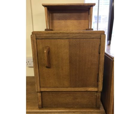 A light oak G Plan bedside cabinet. Single cupboard with top shelf.  Approx. 36 x 62 cm tall.