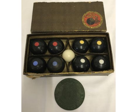 A vintage boxed set of indoor carpet bowls. By Banda complete with rubber target and jack. 