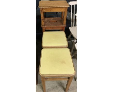 A collection of 4 wooden vintage kitchen stools.  