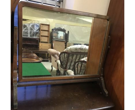 A vintage dark wood framed table top swing mirror.  Approx. 57cm x 69cm.
