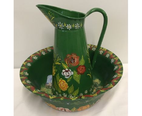 A painted barge ware enamel jug and bowl set.  