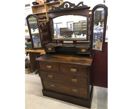A vintage dark wood vanity chest with folding side mirrors. 2 over 2 chest to base with removable mirrors to top. Approx. 92c