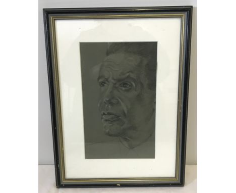 A framed and glazed pastel monochrome portrait.  