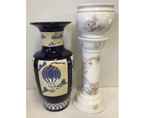 A large ceramic blue and cream balloon decorated vase. Together with a modern ceramic jardinière. Vase approx  52cm tall, gar
