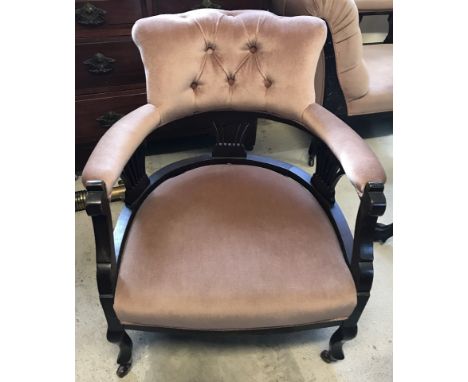 A late Victorian button backed ladies chair with dusky pink velvet upholstery. On ceramic castors and splayed design spindle 