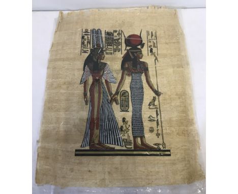 An Egyptian painting on papyrus of red, black, white and gold colouration.  