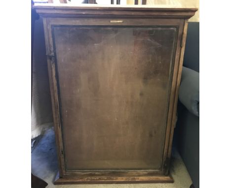 A vintage wooden glass fronted shopfittings cabinet. Made by McCausland, shopfitters of Manchester. 90cm tall x 66cm wide x 1