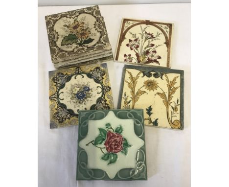 A collection of 8 Victorian ceramic tiles with floral design.  All approx. 15 x 15cm.