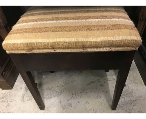 A vintage mahogany piano stool with brown upholstered cushion top.  Approx. 53cm tall.