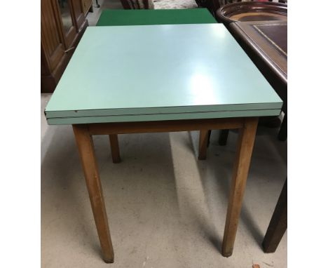Vintage circa 1950's pale green Formica topped draw leaf kitchen table with natural wood legs.  Approx. 71cm x 61cm x 78cm ta