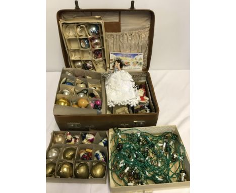 A collection of vintage Christmas decoration. To include baubles, lights, fairy tree topper and Midget Christmas tree cracker