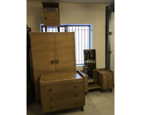 A matching suite of solid wood vintage bedroom furniture. By Russell of Broadway. Comprising a 3 drawer chest of drawers. 2 d