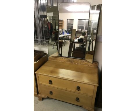An Art Deco oak 2 drawer bedroom chest with folding triple mirror.  Approx. 93cm wide x 157cm tall. 