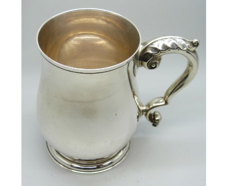A silver mug, Garrard &amp; Co., Birmingham 1971, 327g, underside bears inscription