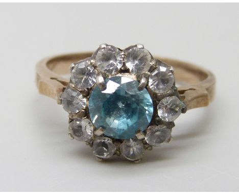 A 9k gold blue and white topaz cluster ring, 2.9g, N