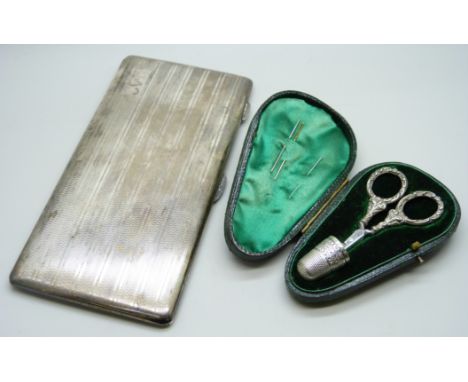 A silver thimble and scissors set and a plated cigarette case, thimble hallmarked Chester 1896