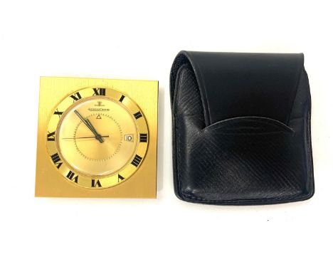 Vintage Jaeger Le Coultre memovox travel alarm clock hand winding in working order complete with jaeger travel pouch 