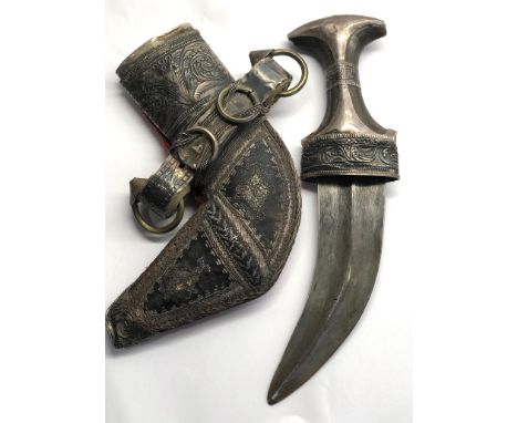 Jambiya dagger please it has a silver coloured scabbard with velvet back the dagger has a horn type grip please see images fo