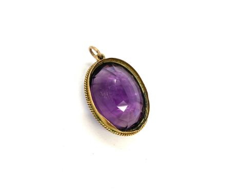 Antique gold mounted amethyst pendant measures approx 3cm by 2.3cm 