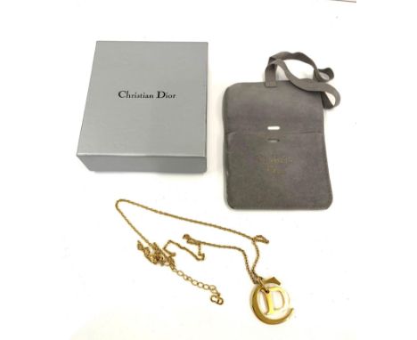 Boxed Christian Dior gold tone pendant and chain 