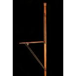 AN EARLY 20TH CENTURY WOODEN GADGET CANE BY 'PRESTO', with fold out seat, the shaft terminating at a
