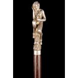 A 19TH CENTURY WHITE METAL HANDLED ROSEWOOD WALKING CANE, the figural grip modelled as 'Pan' and the