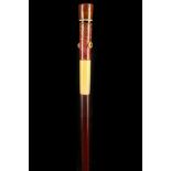 A VERTEBRAL WALKING STICK, with fruitwood crook handle, sectional shaft and horn ferrule, together