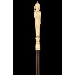 AN IVORY HANDLED ROSEWOOD CANE, the carved figural grip worked to depict an Indian Tribesman,