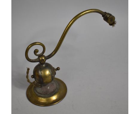 An Early 20th Century Brass Desktop Adjustable Lamp with Circular Weighted Base, Missing Light Fitting, 22cms High 