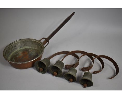 A Collection of Four Vintage Servants Bells and a Copper Frying Pan 