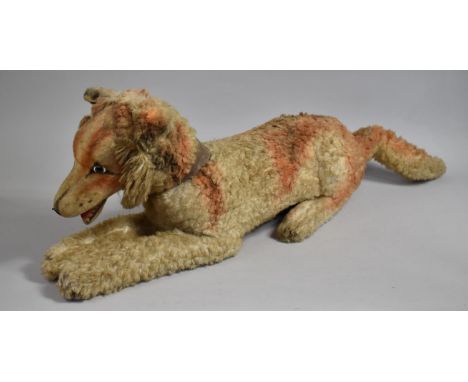 A Vintage Soft Toy in the Form of a Dog, with Bright Eyes, 80cms Long 