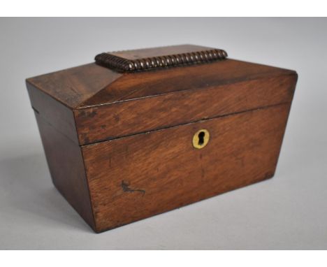 A 19th Century Mahogany Two Division Tea Caddy of Sarcophagus Form, Missing Bun Feet, 20cms Wide 