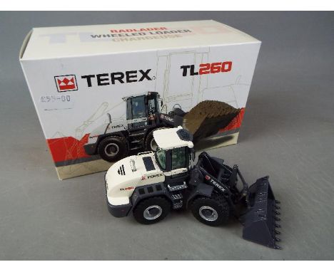NZG - A boxed diecast 1:50 scale NZG #700 Terex TL260 Radlader Wheeled Loader. The model in grey and black appears to be in M