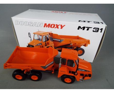 NZG - A boxed diecast 1:50 scale NZG #820 Doosan Moxy MT31 Dump Truck. The model appears to be in Mint condition and is house