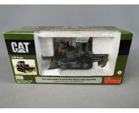 Norscot - A boxed 1:50 scale diecast Norscot #55110 Caterpillar D8R Series II Military Track - Type Tractor. Model appears to