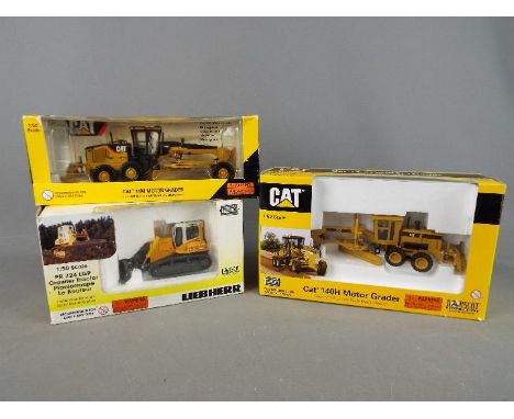 Norscot - A collection of three boxed 1:50 scale diecast construction vehicles by Norscot. Lot includes #55189 Caterpillar 14