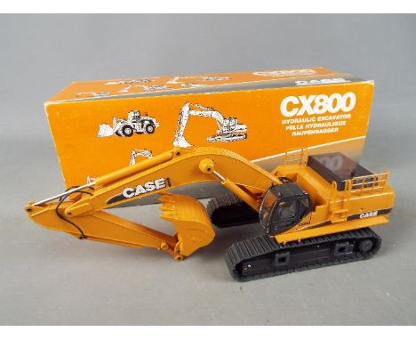 Conrad - A boxed diecast 1:50 scale Conrad #2912 Case CX800 Hydraulic Excavator. The model appears to be in Mint condition ho