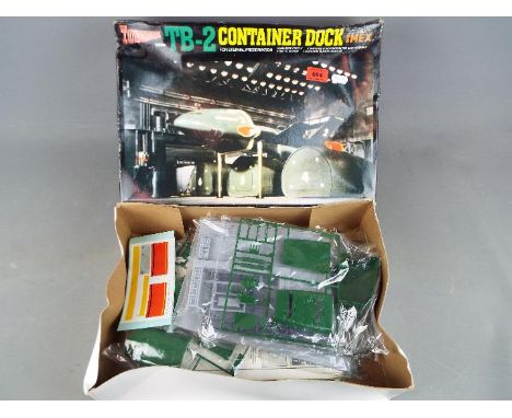 Thunderbirds - a Thunderbirds TB-2 Container Dock plastic model kit by Imex Model Co, model No. 1207, 1:350 scale, contents i