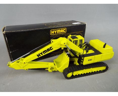 Conrad - A boxed diecast 1:50 scale Conrad #273 Hymac 890 Hydraulic Excavator. The model appears to be in Near Mint condition