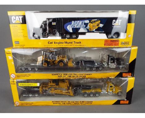 Norscot - Three boxed diecast 1:50 scale trucks by Norscot. Lot consists of #55207 Peterbilt 389 &amp; Trail King Lowboy with