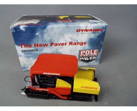 NZG - A boxed diecast 1:50 scale NZG #841 Dynapac SD2500CS Paver. The model in red and yellow appears to be in Mint condition