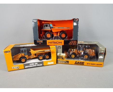 Ertl - A collection of three boxed diecast construction vehicles in 1:50 scale by Ertl. Lot consists of Ertl #14302 Case 330 