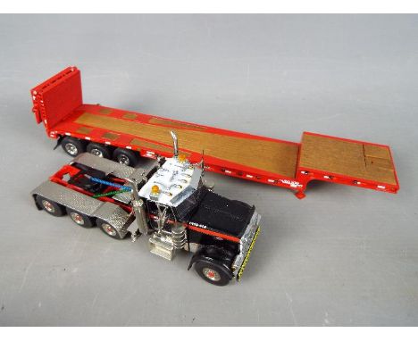 TWH Collectibles - A boxed 1:50 scale diecast Mammoet Peterbilt Truck with Low Loader by TWH Collectibles. The highly detaile