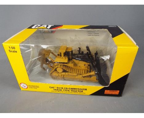 Norscot - A boxed 1:50 scale diecast Norscot #55070 Caterpillar D11R CD Carrydozer Track Type Tractor. The model appears to b